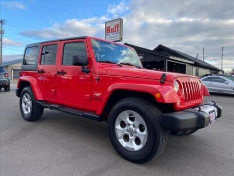 2015 Jeep Wrangler Unlimited for sale at HUFF AUTO GROUP in Jackson MI