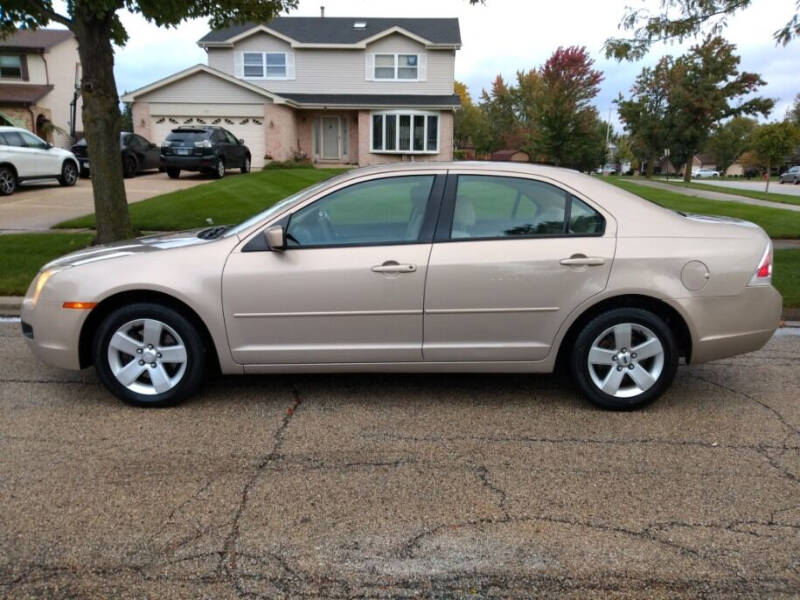 2006 Ford Fusion for sale at ACTION AUTO GROUP LLC in Roselle IL