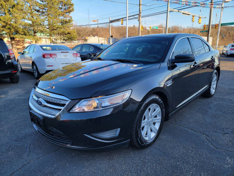 2011 Ford Taurus for sale at Cedar Auto Group LLC in Akron OH