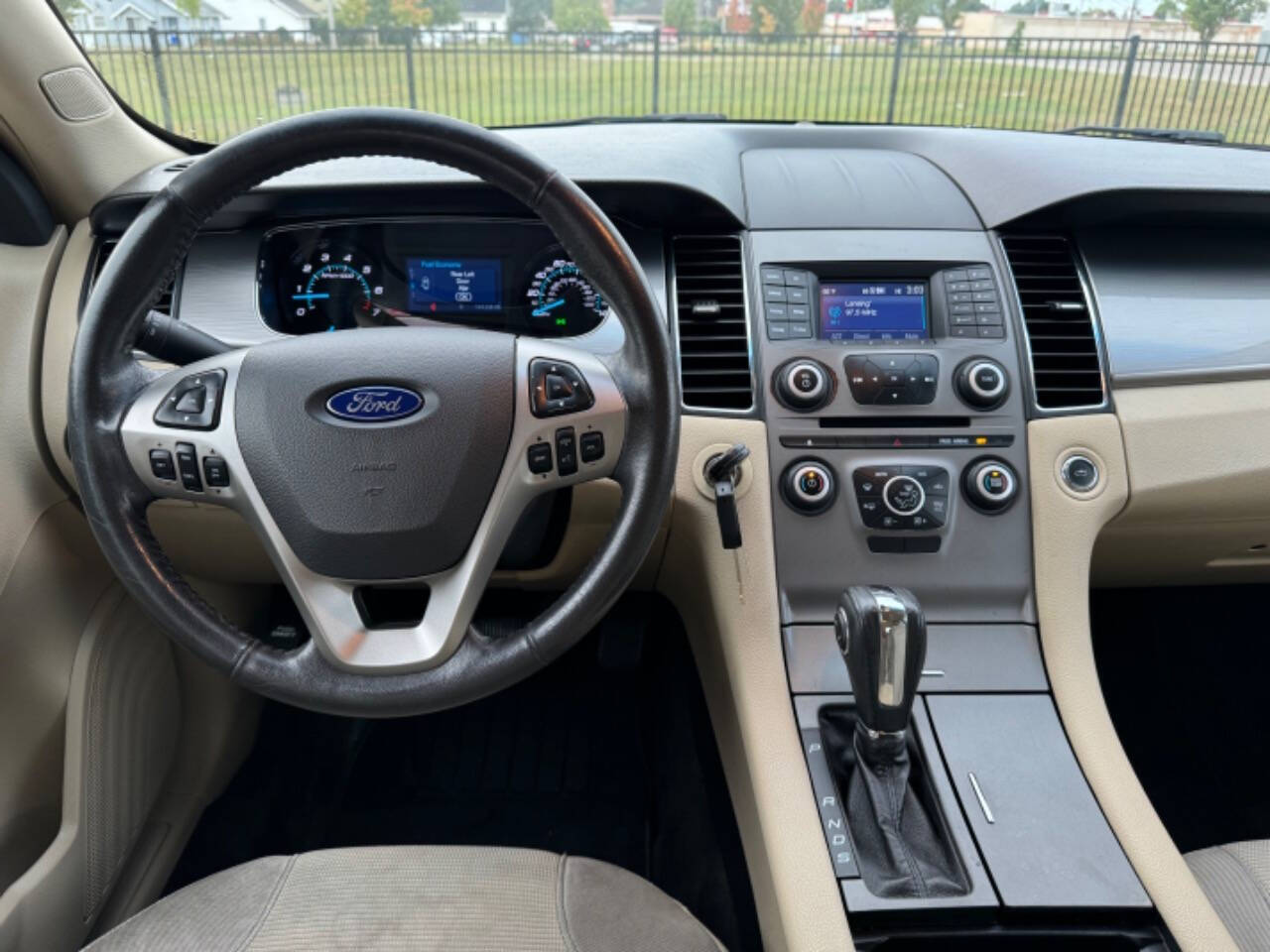 2014 Ford Taurus for sale at Carventure in Lansing, MI