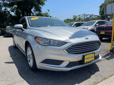 2017 Ford Fusion Hybrid for sale at Din Motors in Passaic NJ