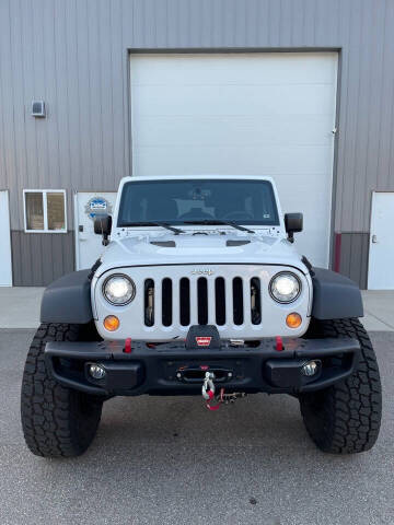 2017 Jeep Wrangler Unlimited for sale at Misar Motors in Ada MI