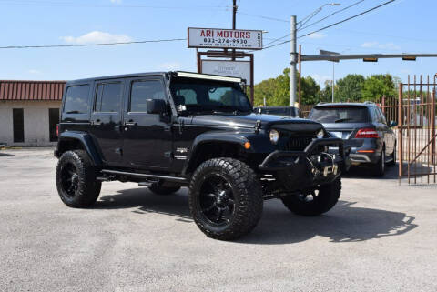 2016 Jeep Wrangler Unlimited for sale at ARI Motors in Houston TX