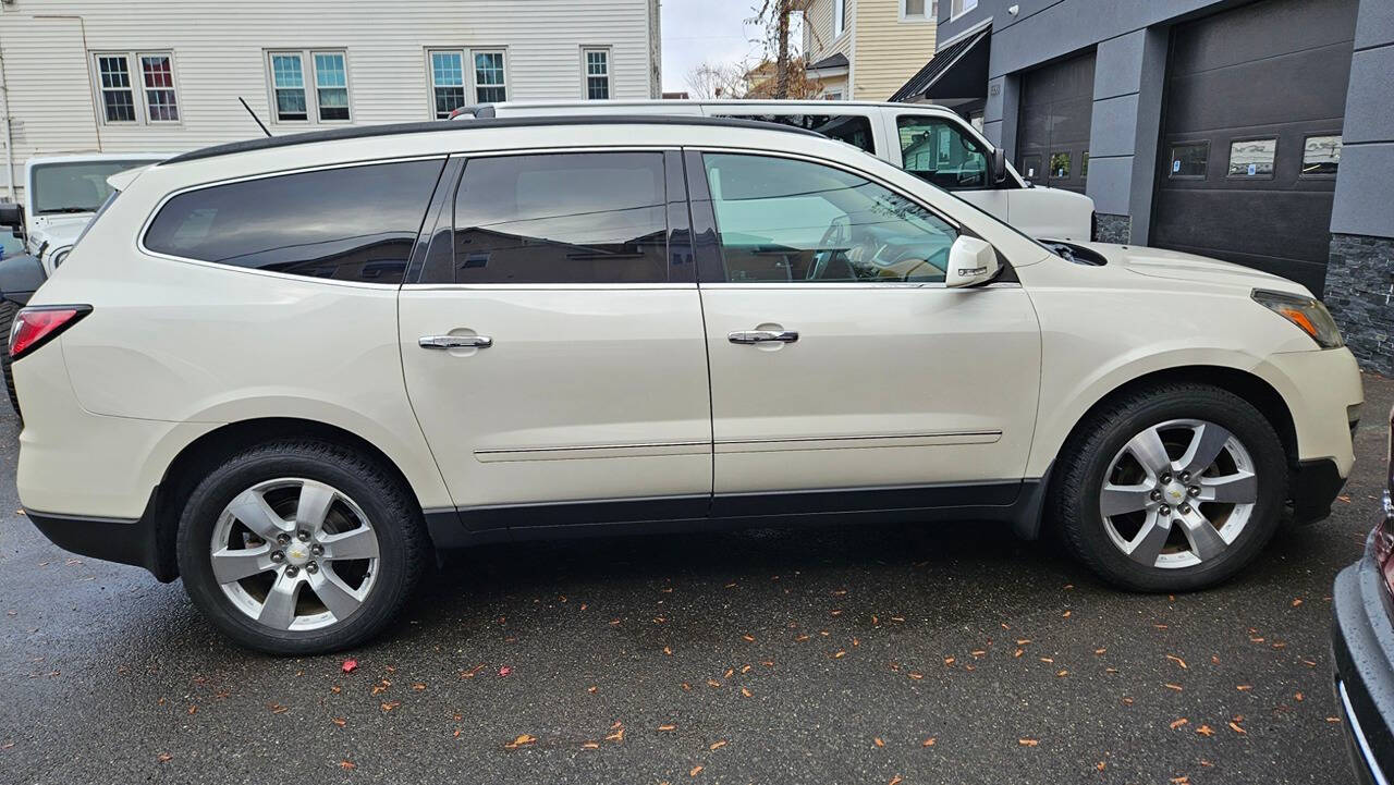 2014 Chevrolet Traverse for sale at RENOS AUTO SALES LLC in Waterbury, CT