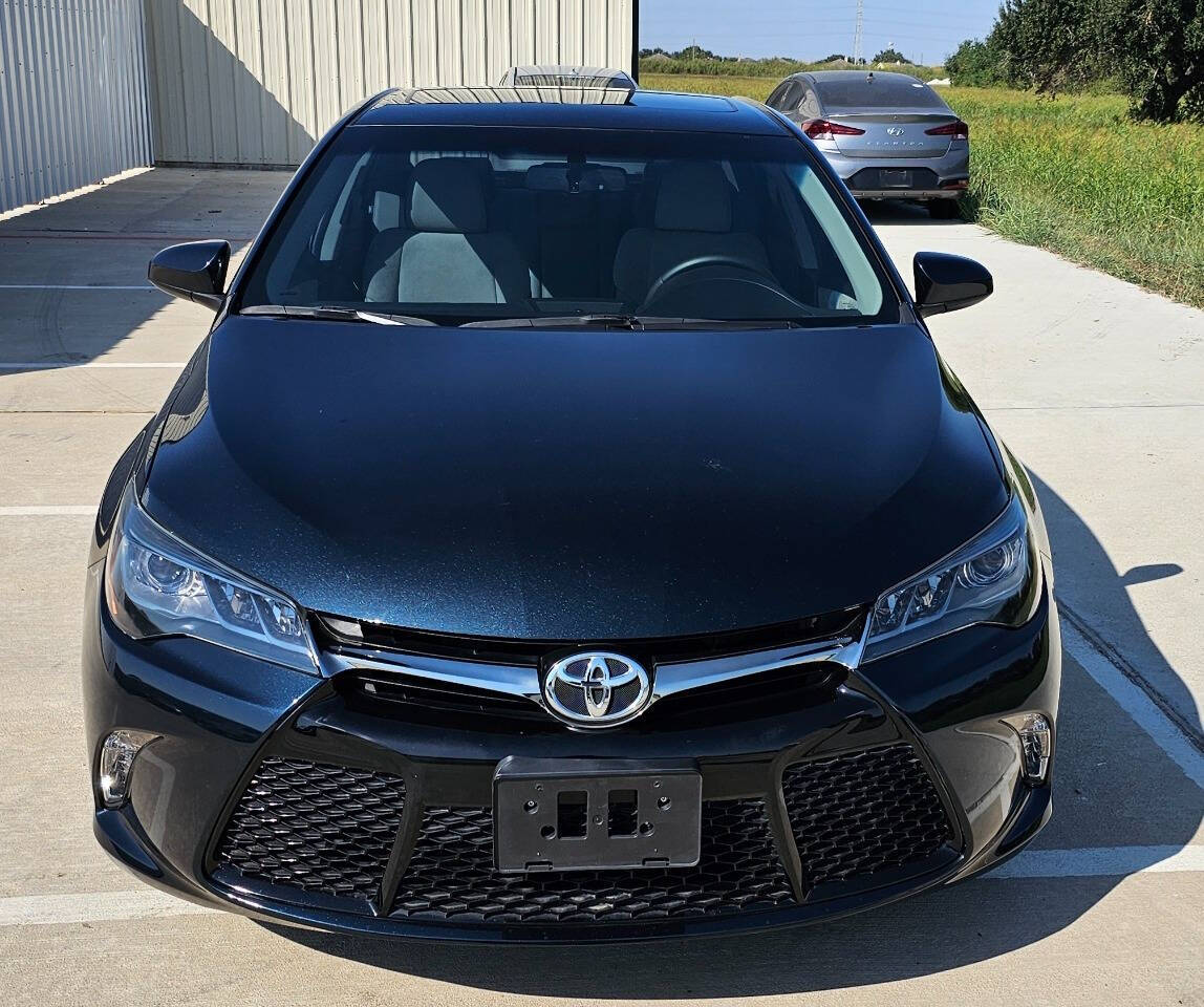 2015 Toyota Camry for sale at CAR MARKET AUTO GROUP in Sugar Land, TX