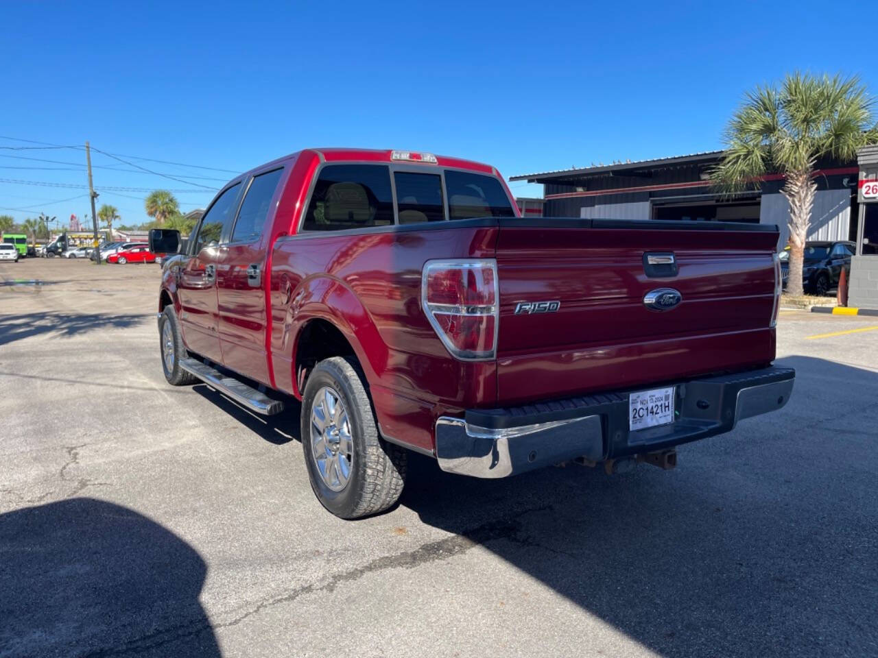 2014 Ford F-150 for sale at SMART CHOICE AUTO in Pasadena, TX