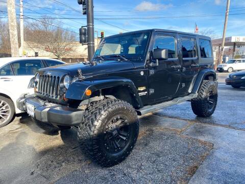 2011 Jeep Wrangler Unlimited for sale at The Car Lot Inc in Cranston RI