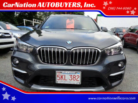 2018 BMW X1 for sale at CarNation AUTOBUYERS Inc. in Rockville Centre NY