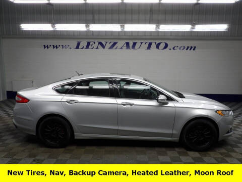 2016 Ford Fusion for sale at LENZ TRUCK CENTER in Fond Du Lac WI