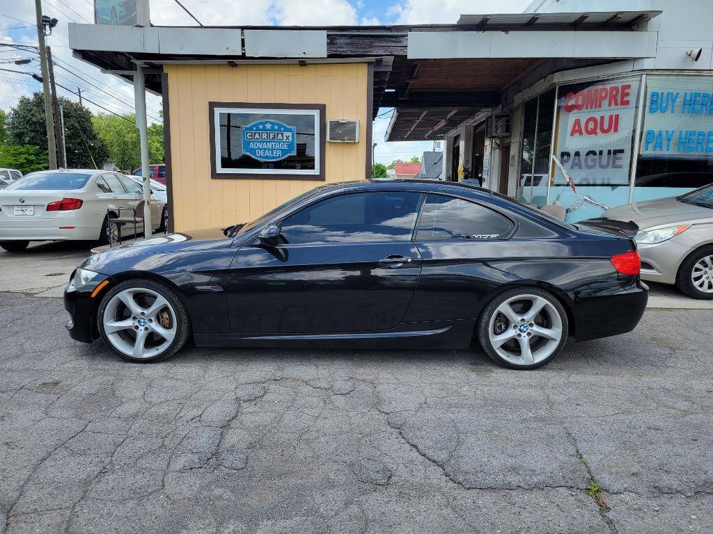 2011 BMW 3 Series for sale at DAGO'S AUTO SALES LLC in Dalton, GA