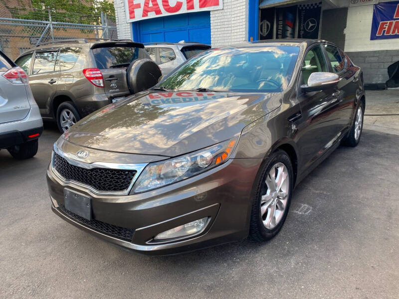 2013 Kia Optima for sale at DEALS ON WHEELS in Newark NJ