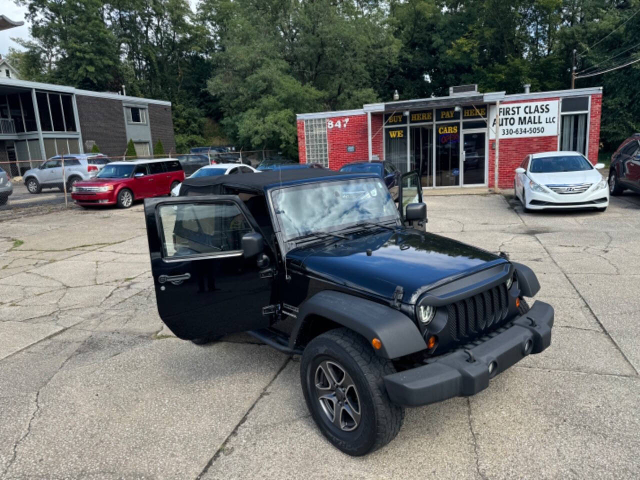 2011 Jeep Wrangler for sale at First Class Auto Mall in Akron, OH