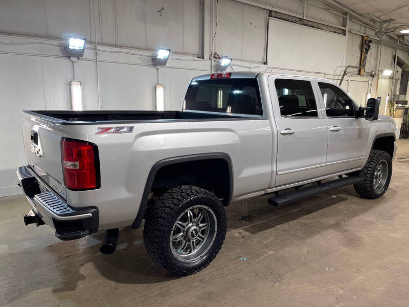 Used 2015 GMC Sierra 2500HD SLE with VIN 1GT12YE84FF121082 for sale in Sioux Falls, SD