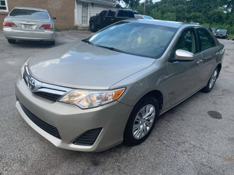 2014 Toyota Camry for sale at Philip Motors Inc in Snellville GA