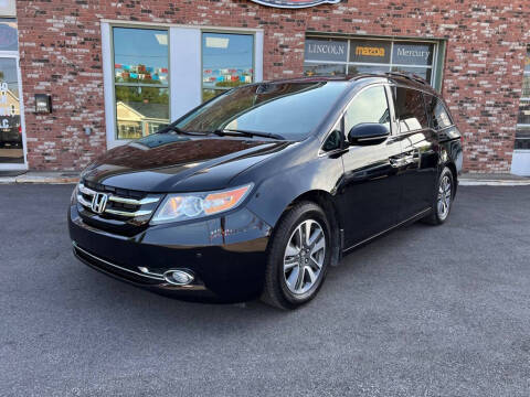 2016 Honda Odyssey for sale at Ohio Car Mart in Elyria OH