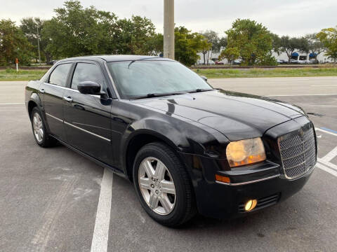 2006 Chrysler 300 for sale at UNITED AUTO BROKERS in Hollywood FL