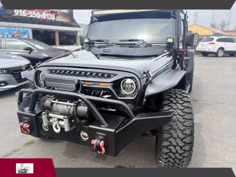 2013 Jeep Wrangler Unlimited for sale at Capital 5 Auto Sales Inc in Sacramento CA