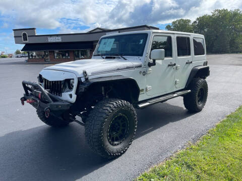2014 Jeep Wrangler Unlimited for sale at JAG AUTO in Webster NY