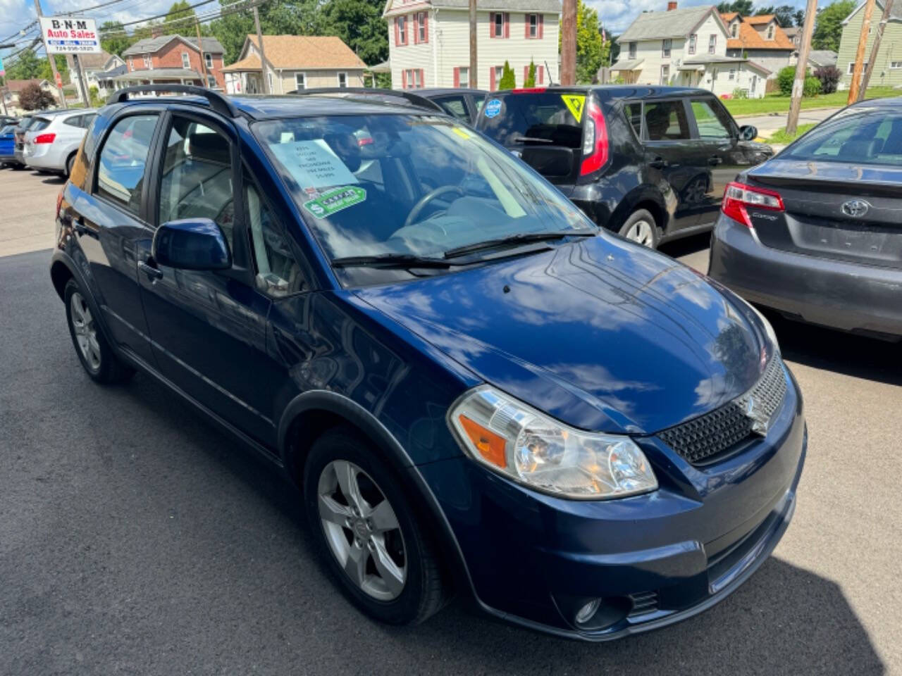 2011 Suzuki SX4 Crossover for sale at B N M Auto Sales Inc in New Castle, PA