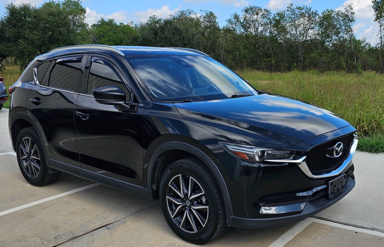 2017 Mazda CX-5 for sale at CAR MARKET AUTO GROUP in Sugar Land, TX