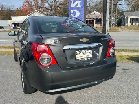 2015 Chevrolet Sonic for sale at Cars for Less in Phenix City AL