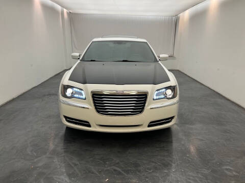 2013 Chrysler 300 for sale at Roman's Auto Sales in Warren MI
