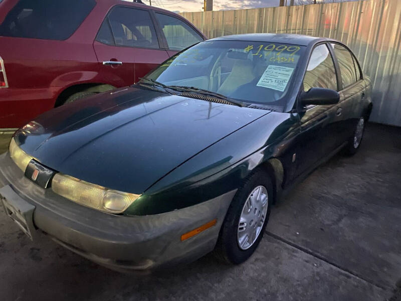 1997 Saturn S-Series for sale at Buy-Fast Autos in Houston TX