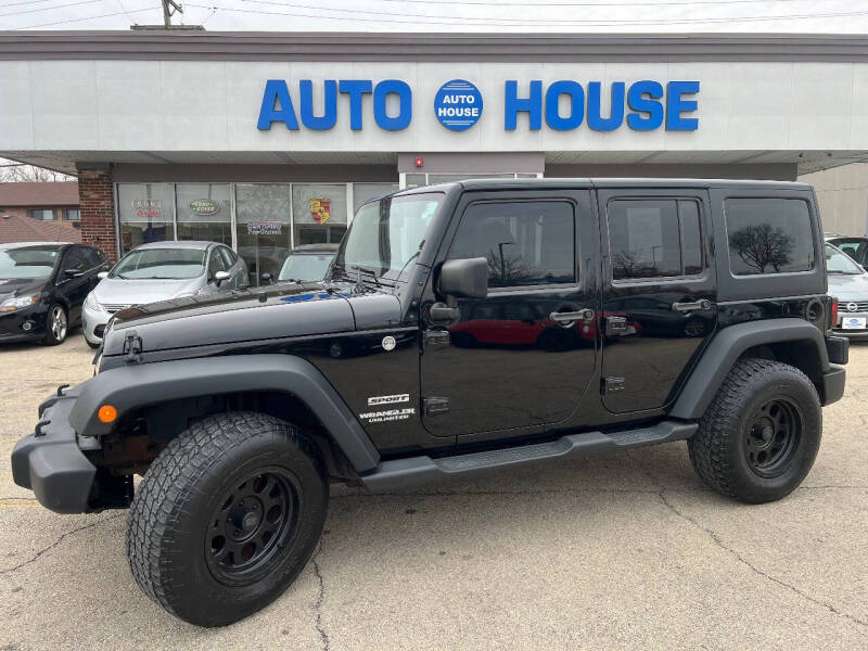 2014 Jeep Wrangler Unlimited for sale at Auto House Motors in Downers Grove IL