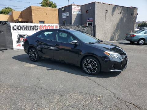 2014 Toyota Corolla for sale at E and M Auto Sales in Bloomington CA