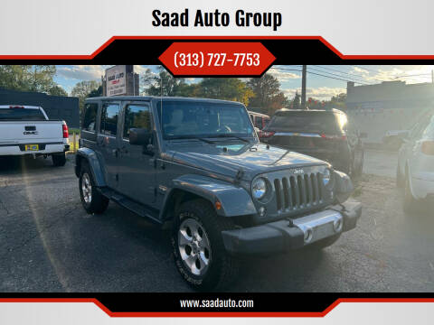 2015 Jeep Wrangler Unlimited for sale at Saad Auto Group in Dearborn Heights MI