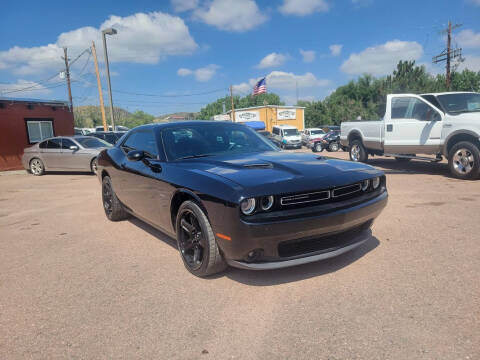 2015 Dodge Challenger for sale at BERKENKOTTER MOTORS in Brighton CO