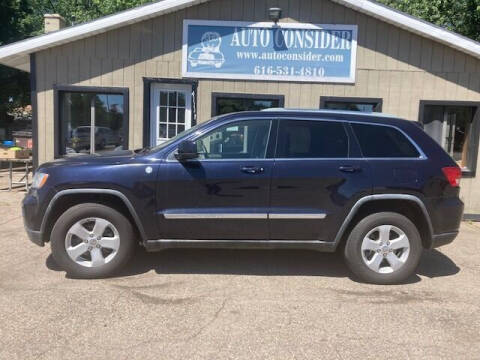 2011 Jeep Grand Cherokee for sale at Auto Consider Inc. in Grand Rapids MI
