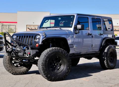 2013 Jeep Wrangler Unlimited for sale at Kustom Carz in Pacoima CA