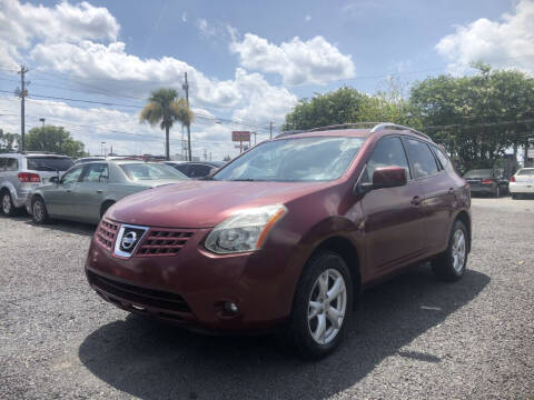 2009 Nissan Rogue for sale at Lamar Auto Sales in North Charleston SC