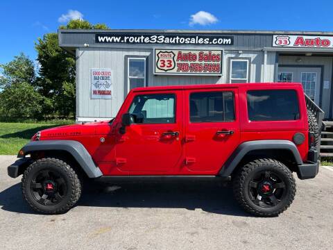 2016 Jeep Wrangler Unlimited for sale at Route 33 Auto Sales in Carroll OH