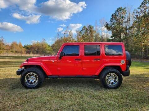 2013 Jeep Wrangler Unlimited for sale at Poole Automotive in Laurinburg NC