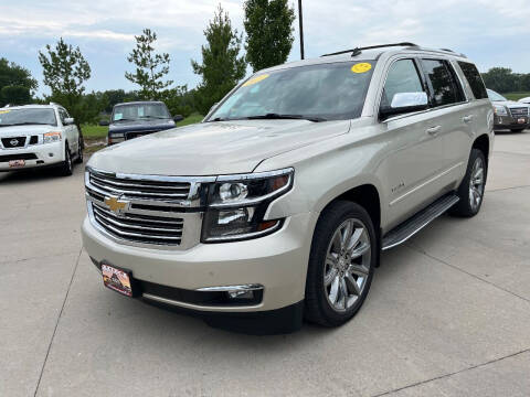 2015 Chevrolet Tahoe for sale at Azteca Auto Sales LLC in Des Moines IA