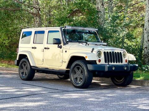 2011 Jeep Wrangler Unlimited for sale at H and S Auto Group in Canton GA