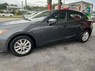 2014 Mazda MAZDA3 for sale at Sunset Point Auto Sales & Car Rentals in Clearwater FL