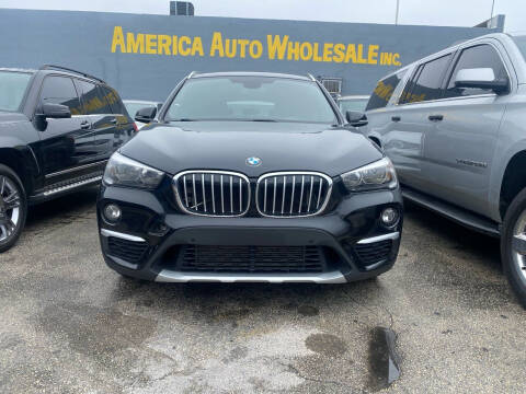 2018 BMW X1 for sale at America Auto Wholesale Inc in Miami FL