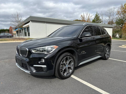 2017 BMW X1 for sale at Noble Auto in Hickory NC