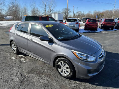 2015 Hyundai Accent for sale at VILLAGE AUTO MART LLC in Portage IN