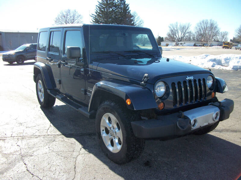 2013 Jeep Wrangler Unlimited for sale at USED CAR FACTORY in Janesville WI