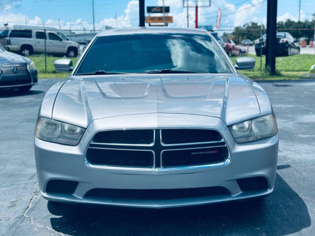 2013 Dodge Charger for sale at NOVA AUTO SALES in Orlando, FL