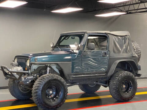 2005 Jeep Wrangler for sale at AutoNet of Dallas in Dallas TX
