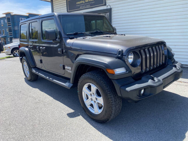 Used 2019 Jeep Wrangler Unlimited Sport S with VIN 1C4HJXDG7KW509356 for sale in Florida, NY