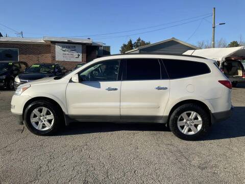 2012 Chevrolet Traverse for sale at Autocom, LLC in Clayton NC