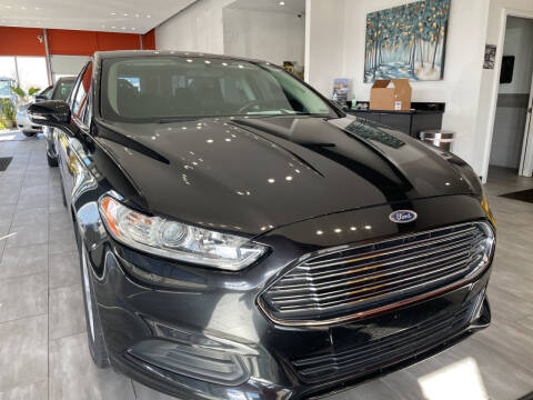 2014 Ford Fusion for sale at Evolution Autos in Whiteland IN