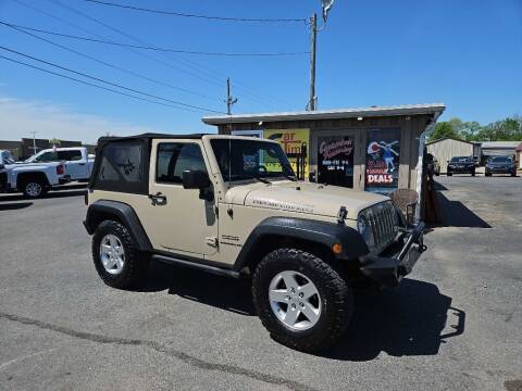 2016 Jeep Wrangler for sale at CarTime in Rogers AR