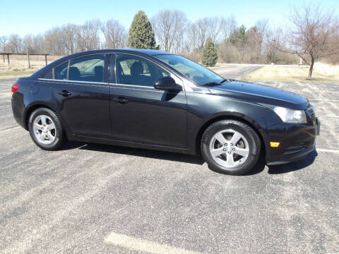 2013 Chevrolet Cruze for sale at Crossroads Used Cars Inc. in Tremont IL